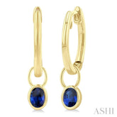 5x3 MM Bezel Set Oval Cut Sapphire Precious Fashion Huggie Earrings in 14K Yellow Gold